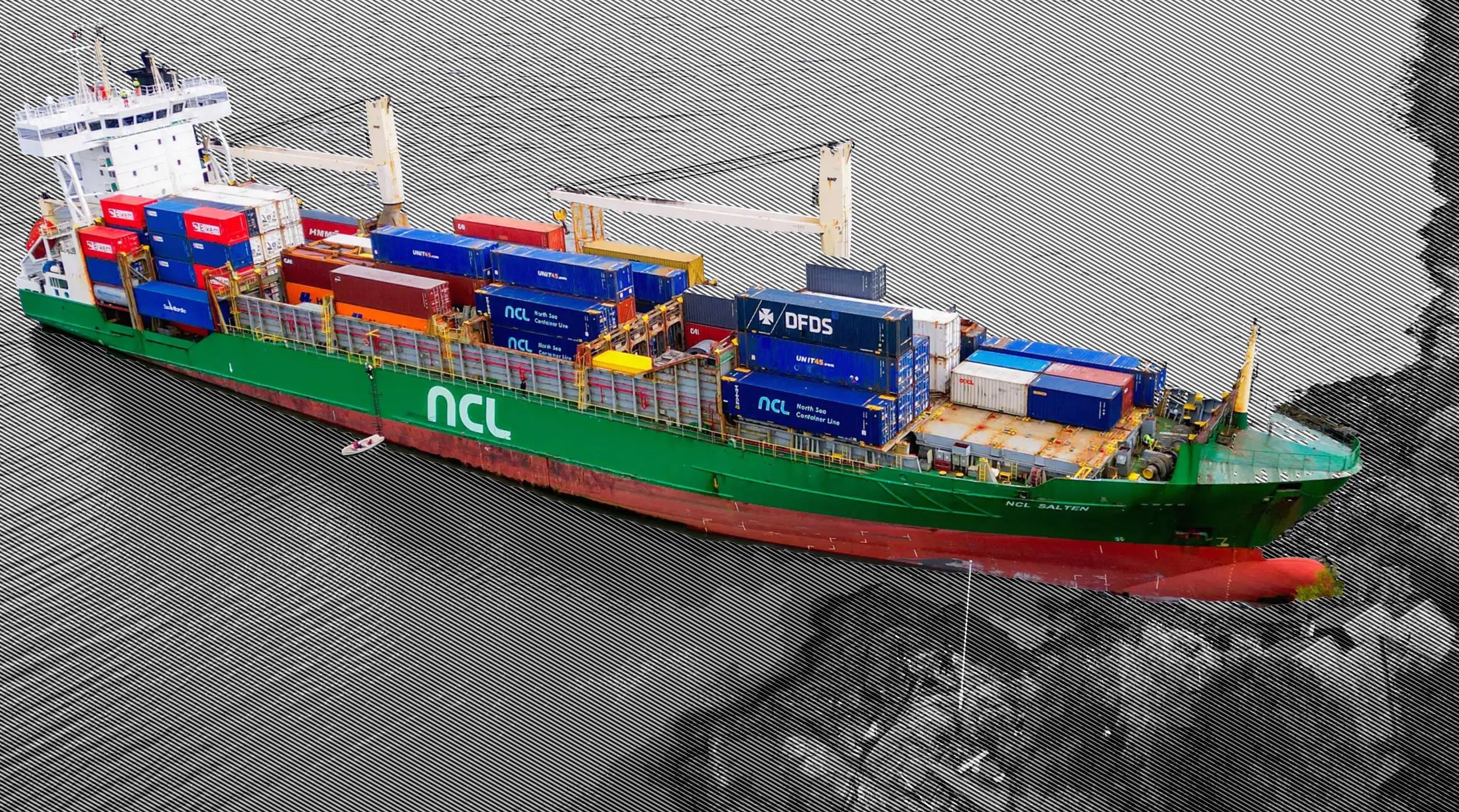 A large container ship runs aground