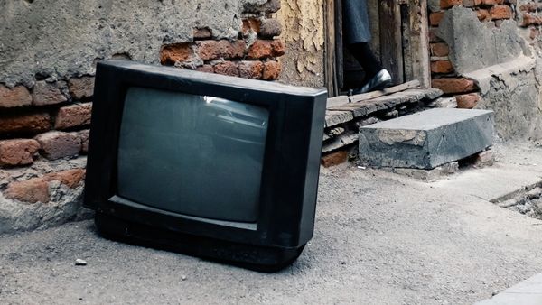 The same television, screen dark