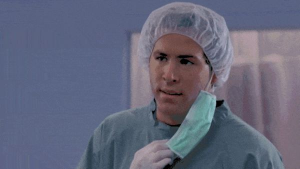 Ryan Reynolds in medical scrubs asks Why?