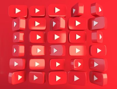 A grid of 6×5 YouTube logos, each with a slightly different rotation